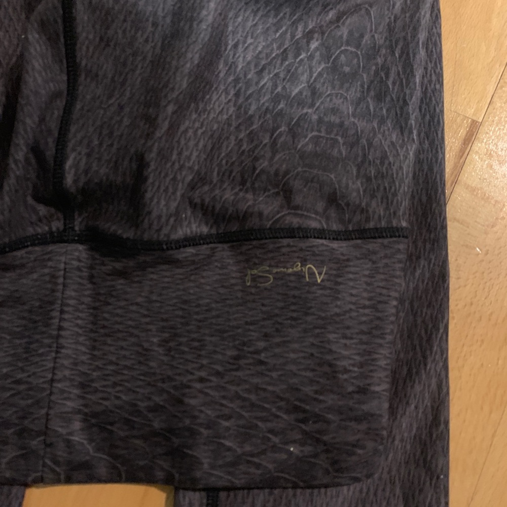 Deep purple and black snakeskin leggings